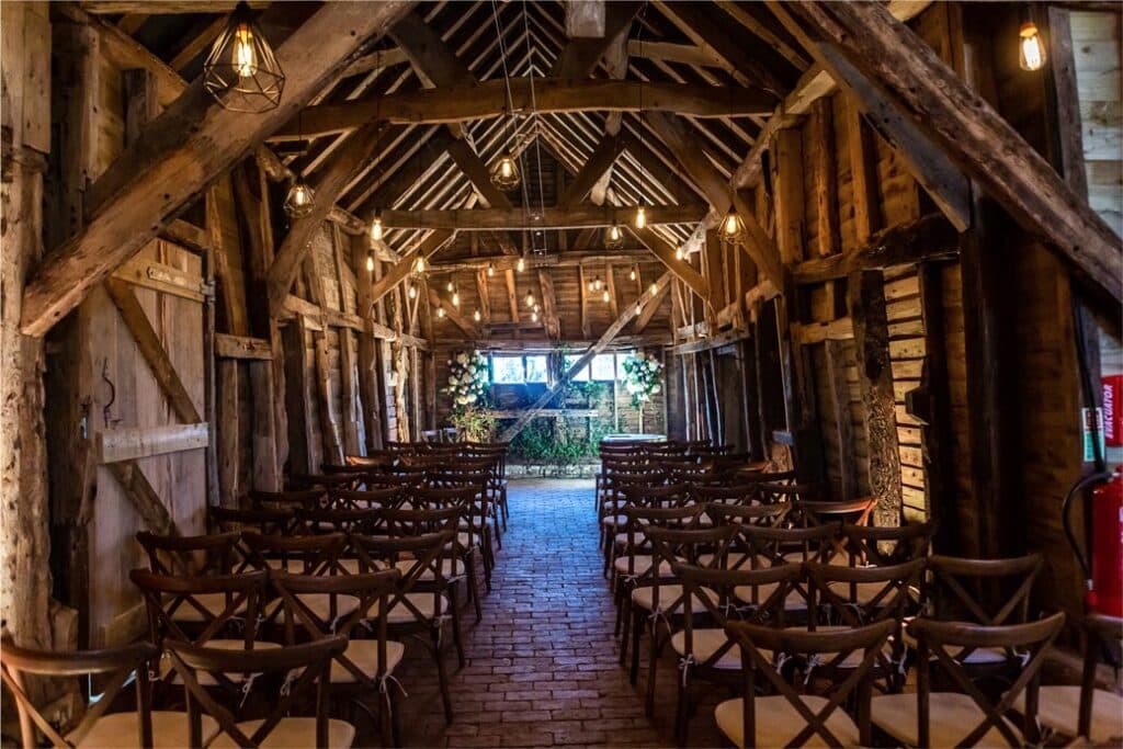 Interior of High Billinghurst Farm set for a ceremony.